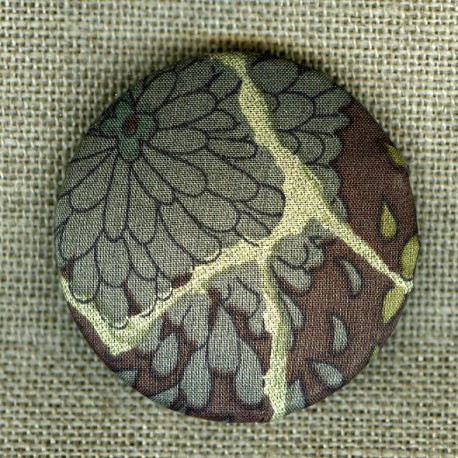 Domed button covered with Liberty fabric