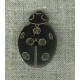 Ladybird button in black horn.