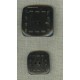Square button in black horn, with stitching motif.