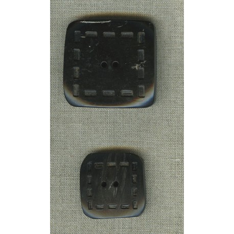 Square button in black horn, with stitching motif.