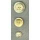 Two-layer button in light-coloured horn.