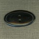 Bouton ovale en corne noire, gravé cercle