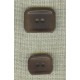 Rectangular chocolate corozo button.