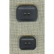 Rectangular charcoal grey corozo button.
