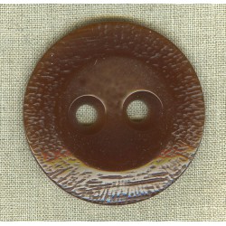 Rust button with intricate wide rim
