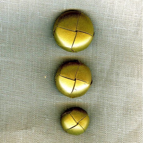 Gold half-ball leather button